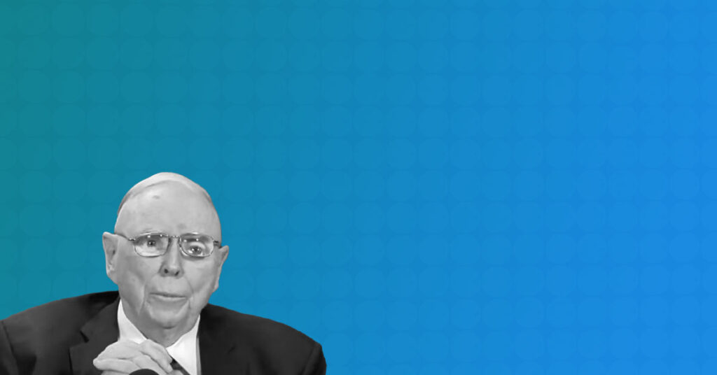 Portrait of Charlie Munger against a blue background, symbolizing his role as a wise and steady advisor.