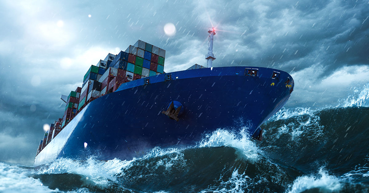 A cargo ship battles rough seas—symbolizing Financial Gravity’s commitment to guiding Family Office Directors through investment volatility.